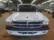 2004 Dodge Dakota Sport z VIN 1D7HL38NX4S579316, wystawiony jako Copart lot #68731865 z przebiegiem 183 085 mil mil oraz Szkoda całkowita • Salvage title. Historia ofert i sprzedaży dostępna na DreamBid. Obrazek 5.