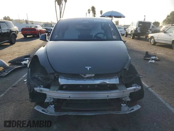 2022 Tesla Model Y Performance with VIN 7SAYGDEF9NF393852, listed as a Copart auction lot 63141094 with 26,972 mi miles and Salvage title. Bid and sale history available at DreamBid. Image 5.