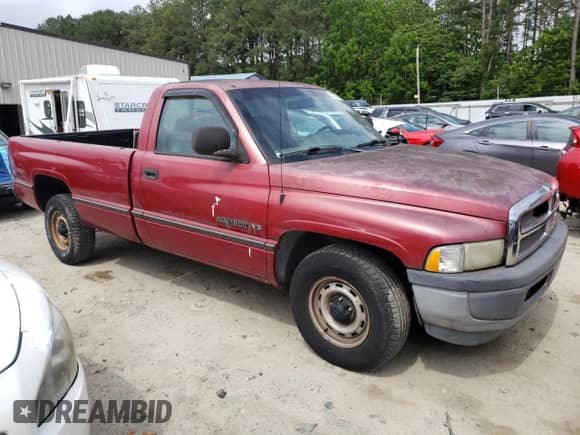1999 Dodge 1500 с VIN 1B7HC16X0XS143923, выставлен на аукционе Copart как лот 72087343 с пробегом 132 425 миль миль и На запчасти • Non repairable. История ставок и продаж доступна на DreamBid. Изображение 4.