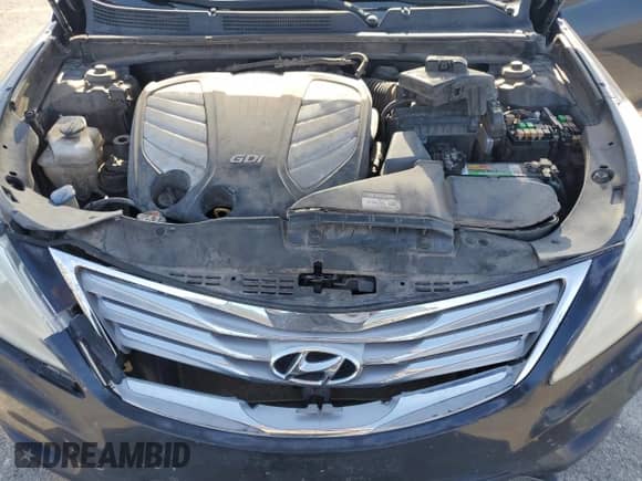 2013 Hyundai Azera с VIN KMHFH4JG1DA302205, выставлен на аукционе Copart как лот 70840334 с пробегом 194 210 миль миль и Списание • Salvage title. История ставок и продаж доступна на DreamBid. Изображение 11.