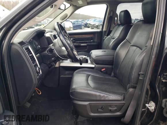 2017 Ram 1500 Laramie with VIN 1C6RR7NM9HS873058, listed as a Copart auction lot 49815555 with 143,741 mi miles and Salvage title. Bid and sale history available at DreamBid. Image 7.