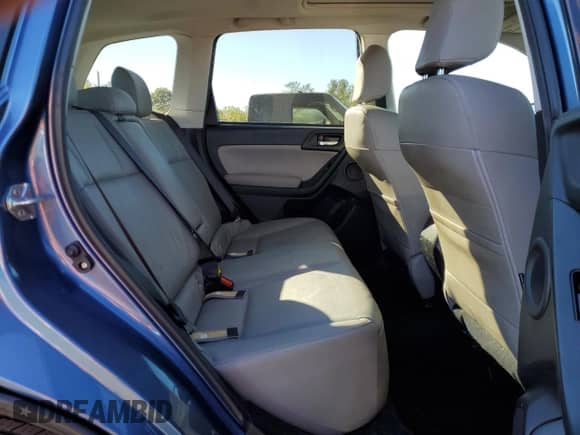 2015 Subaru Forester Touring with VIN JF2SJAWC5FH477385, listed as a Copart auction lot 86609875 with 65,497 mi miles and Salvage title. Bid and sale history available at DreamBid. Image 11.