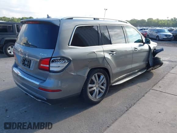 2017 Mercedes-Benz GLS 450 with VIN 4JGDF6EE6HA770387, listed as a IAAI auction lot 43050470 with 104,872 mi miles and . Bid and sale history available at DreamBid. Image 4.