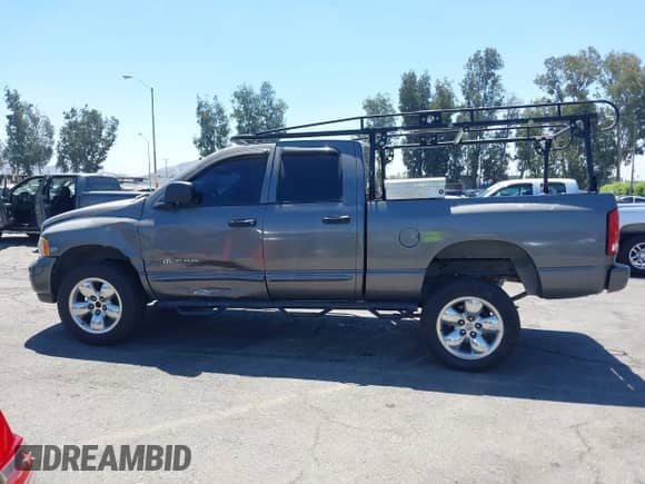 2004 Dodge 1500 SLT with VIN 1D7HU18D14S690006, listed as a IAAI auction lot 43018138 with 185,906 mi miles and . Bid and sale history available at DreamBid. Image 14.
