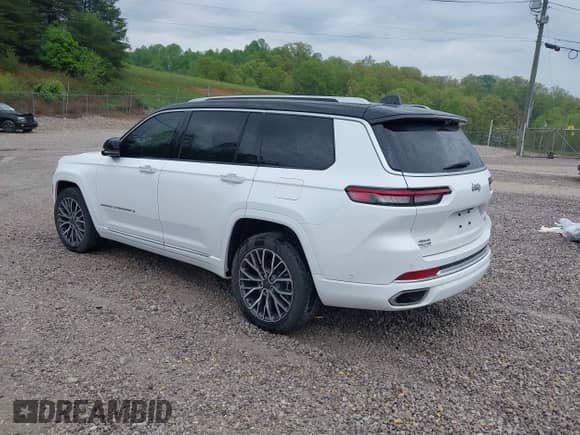 2023 Jeep Grand Cherokee Summit Reserve with VIN 1C4RJKET9P8725689, listed as a IAAI auction lot 42120583 with 15,108 mi miles and . Bid and sale history available at DreamBid. Image 3.