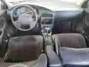 2000 Saturn SL with VIN 1G8ZK5271YZ182706, listed as a Copart auction lot 70810135 with 180,566 mi miles and Salvage title. Bid and sale history available at DreamBid. Image 8.