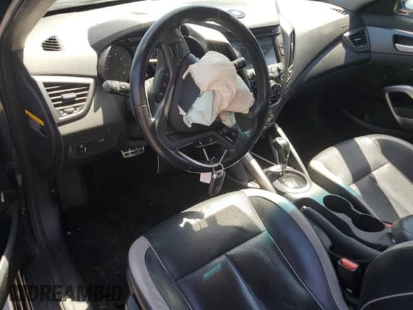 2014 Hyundai Veloster Turbo R-Spec с VIN KMHTC6AE0EU191187, выставлен на аукционе Copart как лот 65017625 с пробегом 134 079 миль миль и Списание • Salvage title. История ставок и продаж доступна на DreamBid. Изображение 8.