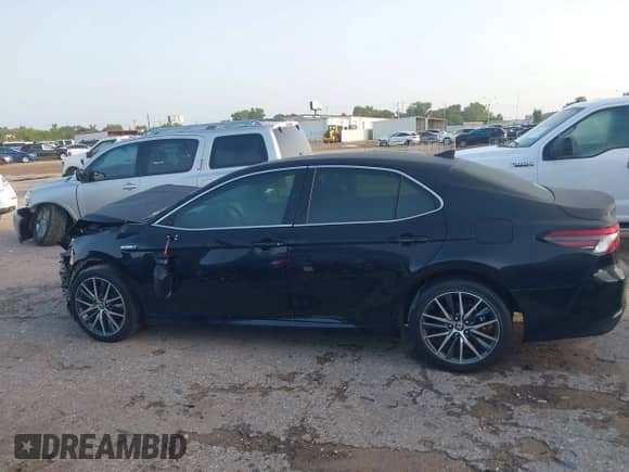 2021 Toyota Camry Hybrid XLE with VIN 4T1F31AK6MU547694, listed as a IAAI auction lot 42618333 with 18,489 mi miles and . Bid and sale history available at DreamBid. Image 14.