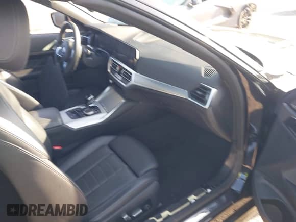 2022 BMW 4 Series 430i with VIN WBA23AT06NCJ10779, listed as a IAAI auction lot 42000961 with 49,634 mi miles and . Bid and sale history available at DreamBid. Image 5.