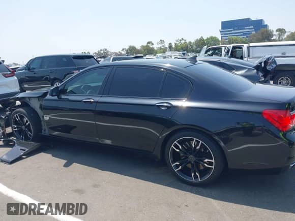 2012 BMW 7 Series 750Li xDrive с VIN WBAKC8C52CC435298, выставлен на аукционе IAAI как лот 42587250 с пробегом 153 391 миль миль и . История ставок и продаж доступна на DreamBid. Изображение 14.