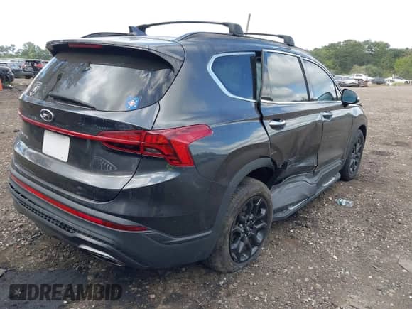 2022 Hyundai Santa Fe XRT with VIN 5NMS64AJ8NH428704, listed as a IAAI auction lot 43082726 with 50,307 mi miles and . Bid and sale history available at DreamBid. Image 6.