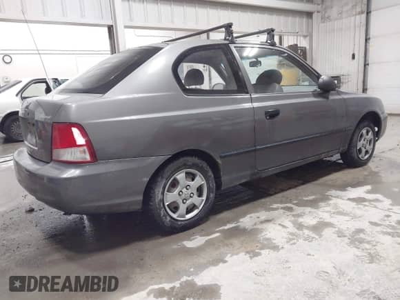 2002 Hyundai Accent z VIN KMHCF35G22U230228, wystawiony jako IAAI lot #43425125 z przebiegiem 185 744 mil mil oraz . Historia ofert i sprzedaży dostępna na DreamBid. Obrazek 4.