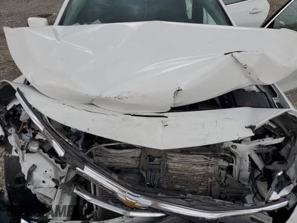 2021 Chevrolet Malibu LS z VIN 1G1ZC5ST9MF085998, wystawiony jako Copart lot #69602575 z przebiegiem Nie podano mil oraz Szkoda całkowita • Salvage title. Historia ofert i sprzedaży dostępna na DreamBid. Obrazek 11.