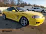 2006 Hyundai Tiburon GT с VIN KMHHN65FX6U202815, выставлен на аукционе Copart как лот 88673255 с пробегом Не указан миль и Списание • Salvage title. История ставок и продаж доступна на DreamBid. Изображение 4.