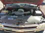 2002 Chevrolet Suburban LT z VIN 1GNEC16ZX2J231601, wystawiony jako Copart lot #75348404 z przebiegiem Nie podano mil oraz Szkoda całkowita • Salvage title. Historia ofert i sprzedaży dostępna na DreamBid. Obrazek 13.