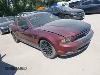 2012 Ford Mustang Premium with VIN 1ZVBP8AM6C5215634, listed as a IAAI auction lot 43134761 with 90,972 mi miles and . Bid and sale history available at DreamBid. Image 1.