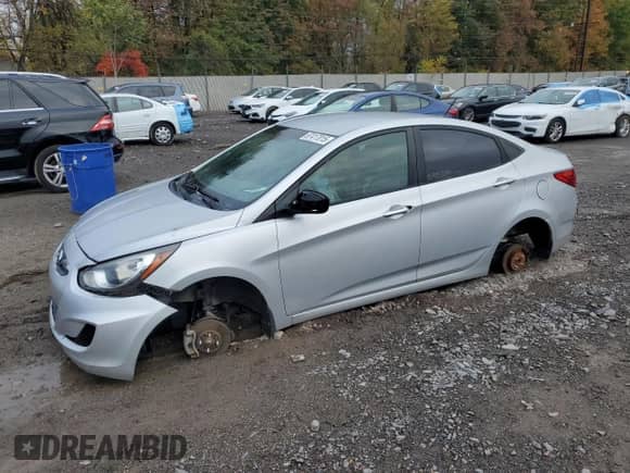 2012 Hyundai Accent GLS z VIN KMHCU4AE1CU234062, wystawiony jako Copart lot #87417015 z przebiegiem Nie podano mil oraz Szkoda całkowita • Salvage title. Historia ofert i sprzedaży dostępna na DreamBid. Obrazek 1.