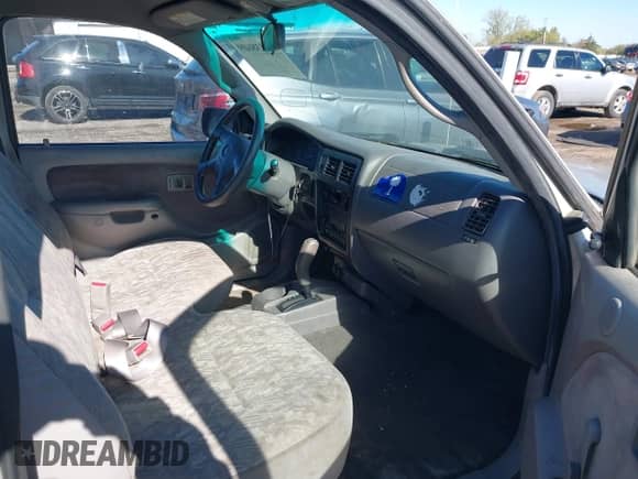 2002 Toyota Tacoma with VIN 5TENL42N32Z074285, listed as a IAAI auction lot 43438609 with 160,565 mi miles and . Bid and sale history available at DreamBid. Image 5.