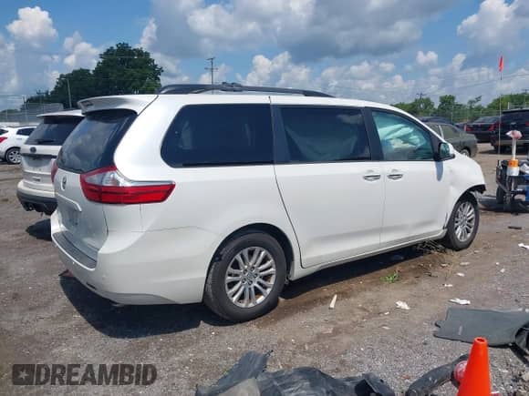 2015 Toyota Sienna XLE with VIN 5TDYK3DC5FS623932, listed as a IAAI auction lot 42716247 with 93,291 mi miles and . Bid and sale history available at DreamBid. Image 4.