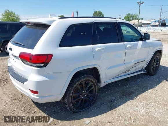 2020 Jeep Grand Cherokee Altitude with VIN 1C4RJFAGXLC271279, listed as a IAAI auction lot 42296705 with 72,172 mi miles and . Bid and sale history available at DreamBid. Image 4.