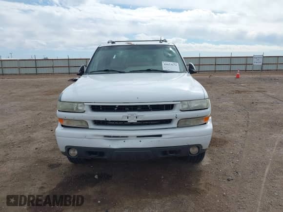 2005 Chevrolet Suburban LT z VIN 3GNEC16Z95G288863, wystawiony jako IAAI lot #41653675 z przebiegiem 309 977 mil mil oraz . Historia ofert i sprzedaży dostępna na DreamBid. Obrazek 12.