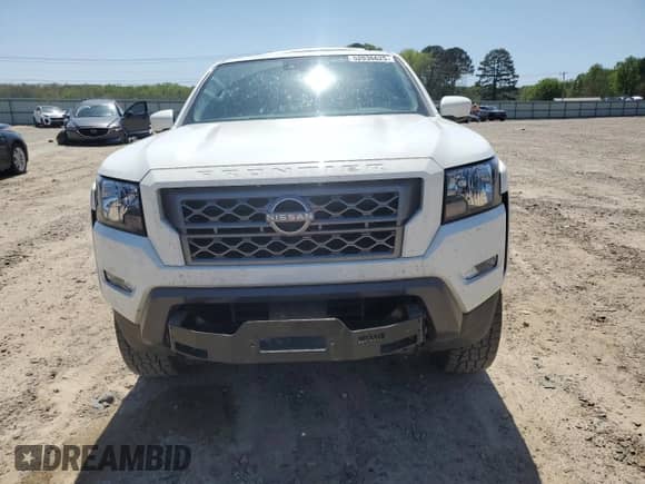 2023 Nissan Frontier SV with VIN 1N6ED1FK1PN665928, listed as a Copart auction lot 52036625 with 23,760 mi miles and Salvage title. Bid and sale history available at DreamBid. Image 5.