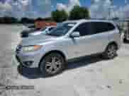 2012 Hyundai Santa Fe SE with VIN 5XYZH4AG2CG134641, listed as a Copart auction lot 66824685 with 194,050 mi miles and Salvage title. Bid and sale history available at DreamBid. Image 1.
