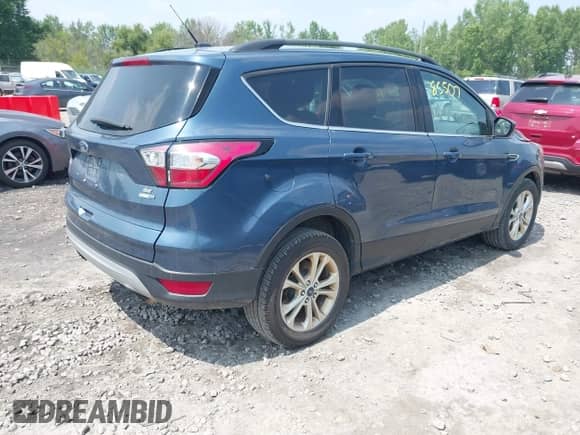 2018 Ford Escape SE с VIN 1FMCU9GD2JUB15834, выставлен на аукционе IAAI как лот 42885507 с пробегом 189 098 миль миль и . История ставок и продаж доступна на DreamBid. Изображение 4.