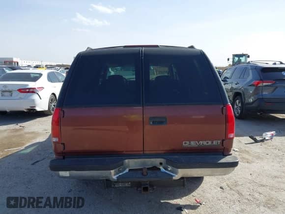 1999 Chevrolet Tahoe with VIN 1GNEC13R9XJ341261, listed as a IAAI auction lot 41741710 with 234,676 mi miles and . Bid and sale history available at DreamBid. Image 15.