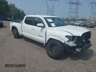 2023 Toyota Tacoma SR5 z VIN 3TMDZ5BN5PM142395, wystawiony jako IAAI lot #42948374 z przebiegiem 36 490 mil mil oraz . Historia ofert i sprzedaży dostępna na DreamBid. Obrazek 1.
