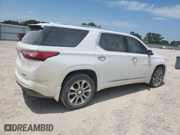 2018 Chevrolet Traverse Premier with VIN 1GNEVJKW4JJ270057, listed as a Copart auction lot 64105845 with 146,063 mi miles and Salvage title. Bid and sale history available at DreamBid. Image 3.