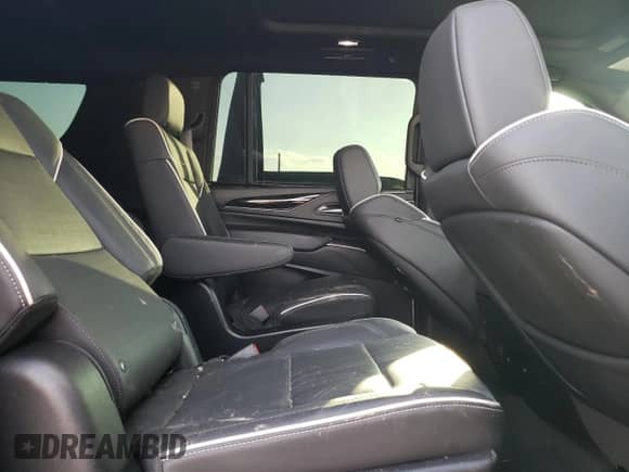 2024 Cadillac Escalade with VIN 1GYS4PKT3RR207675, listed as a Copart auction lot 77889674 with 34,951 mi miles and Salvage title. Bid and sale history available at DreamBid. Image 11.