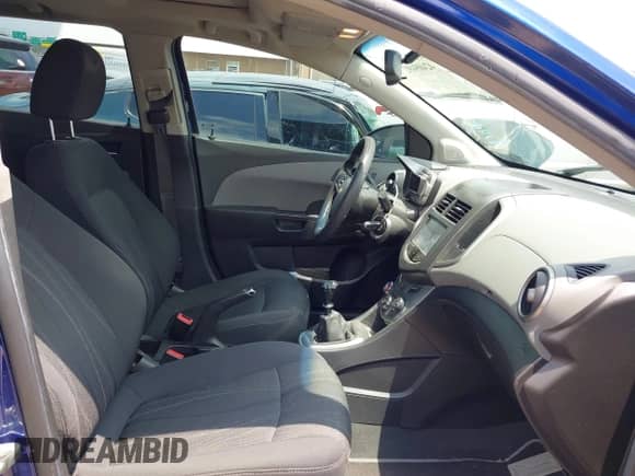 2014 Chevrolet Sonic LT with VIN 1G1JD6SBXE4170952, listed as a IAAI auction lot 42409492 with 134,049 mi miles and . Bid and sale history available at DreamBid. Image 5.