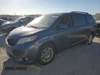 2015 Toyota Sienna XLE with VIN 5TDYK3DC2FS530978, listed as a Copart auction lot 86070055 with 191,926 mi miles and Salvage title. Bid and sale history available at DreamBid. Image 1.