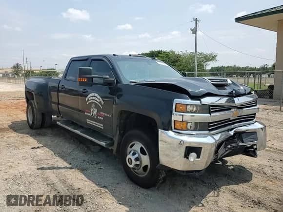 2018 Chevrolet Silverado 3500HD LT с VIN 1GC4KZCY1JF284528, выставлен на аукционе Copart как лот 59693665 с пробегом 301 957 миль миль и Списание • Salvage title. История ставок и продаж доступна на DreamBid. Изображение 14.