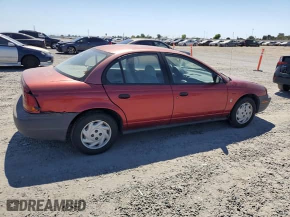 1997 Saturn SL с VIN 1G8ZF5285VZ396736, выставлен на аукционе Copart как лот 63685875 с пробегом 273 724 миль миль и Списание • Salvage title. История ставок и продаж доступна на DreamBid. Изображение 3.