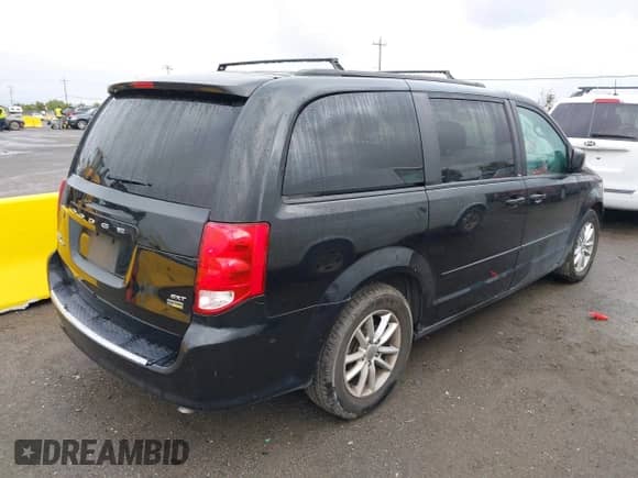 2014 Dodge Grand Caravan SXT with VIN 2C4RDGCG4ER349348, listed as a IAAI auction lot 43453757 with 68,066 mi miles and . Bid and sale history available at DreamBid. Image 4.