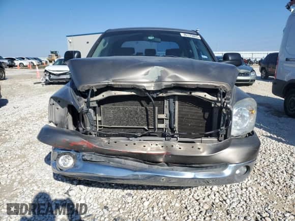 2007 Dodge 1500 SLT z VIN 3D7KR19D67G825885, wystawiony jako Copart lot #46175865 z przebiegiem 167 971 mil mil oraz Szkoda całkowita • Salvage title. Historia ofert i sprzedaży dostępna na DreamBid. Obrazek 5.
