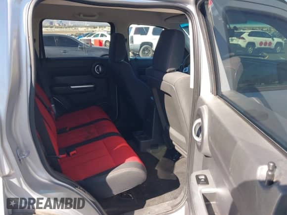 2008 Dodge Nitro R/T with VIN 1D8GU58658W115101, listed as a IAAI auction lot 43501471 with 196,935 mi miles and . Bid and sale history available at DreamBid. Image 8.