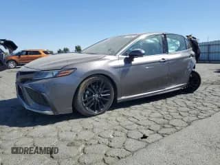 2023 Toyota Camry Hybrid XSE с VIN 4T1K31AK6PU615026, выставлен на аукционе Copart как лот 83769475 с пробегом 141 199 миль миль и Списание • Salvage title. История ставок и продаж доступна на DreamBid. Изображение 1.