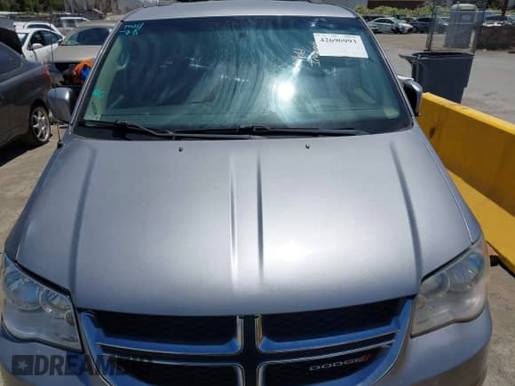 2013 Dodge Grand Caravan SXT with VIN 2C4RDGCG5DR669051, listed as a IAAI auction lot 42690993 with Not provided miles and . Bid and sale history available at DreamBid. Image 12.