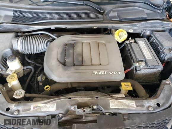 2018 Dodge Grand Caravan SE with VIN 2C4RDGBGXJR162367, listed as a Copart auction lot 80071825 with 130,111 mi miles and Salvage title. Bid and sale history available at DreamBid. Image 12.