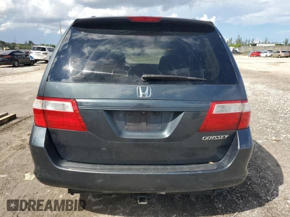 2005 Honda Odyssey EX с VIN 5FNRL38495B401224, выставлен на аукционе Copart как лот 80556355 с пробегом 258 303 миль миль и Списание • Salvage title. История ставок и продаж доступна на DreamBid. Изображение 6.