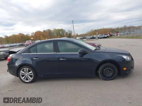 2014 Chevrolet Cruze LTZ with VIN 1G1PG5SB1E7306329, listed as a IAAI auction lot 43476229 with 156,532 mi miles and . Bid and sale history available at DreamBid. Image 13.