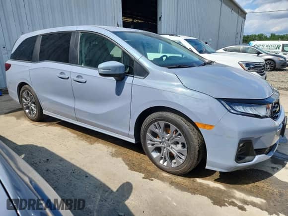 2025 Honda Odyssey Touring с VIN 5FNRL6H87SB074287, выставлен на аукционе Copart как лот 65152345 с пробегом Не указан миль и Списание • Salvage title. История ставок и продаж доступна на DreamBid. Изображение 4.