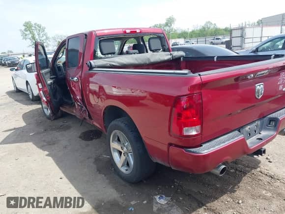 2012 Ram 1500 Express z VIN 1C6RD7FT1CS318554, wystawiony jako IAAI lot #42063789 z przebiegiem Nie podano mil oraz . Historia ofert i sprzedaży dostępna na DreamBid. Obrazek 3.
