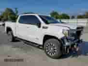2020 GMC Sierra 1500 AT4 with VIN 3GTU9EET6LG455054, listed as a Copart auction lot 71265025 with 70,804 mi miles and Salvage title. Bid and sale history available at DreamBid. Image 4.