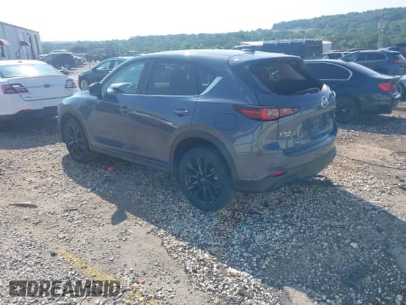 2023 Mazda CX-5 S Carbon Edition z VIN JM3KFBCM9P0211734, wystawiony jako IAAI lot #42439734 z przebiegiem 22 886 mil mil oraz . Historia ofert i sprzedaży dostępna na DreamBid. Obrazek 6.