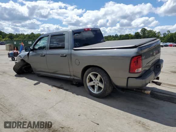 2012 Ram 1500 Express with VIN 1C6RD7KT0CS344844, listed as a Copart auction lot 70133435 with 159,568 mi miles and Salvage title. Bid and sale history available at DreamBid. Image 2.