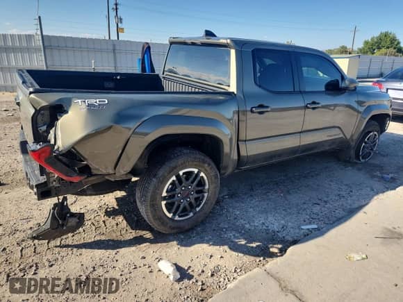 2024 Toyota Tacoma TRD Sport with VIN 3TMLB5JN4RM049470, listed as a Copart auction lot 81793685 with 7,521 mi miles and Salvage title. Bid and sale history available at DreamBid. Image 3.